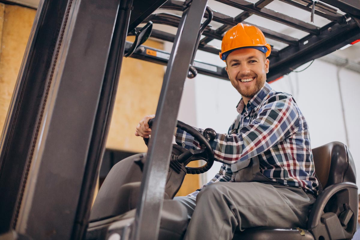 man-working-at-warehouse-and-driving-forklift-baja